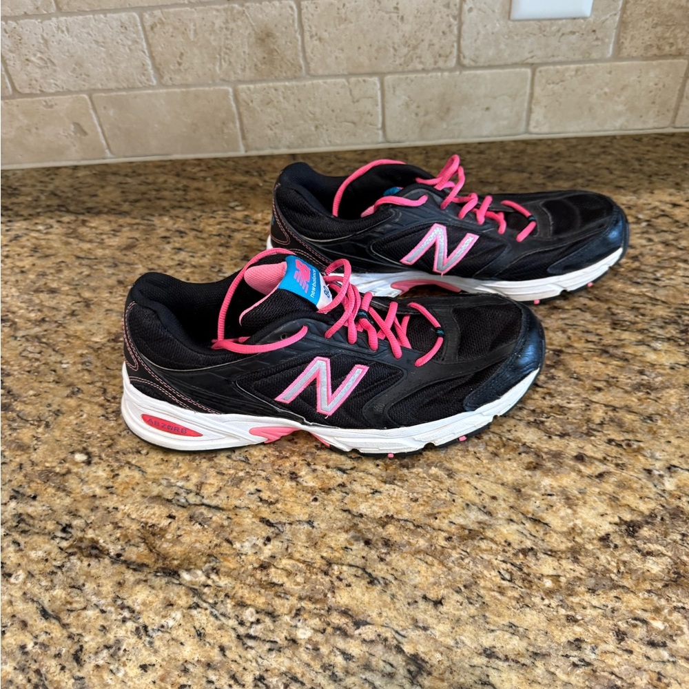 New Balance Women's Black and Pink Running Shoes
Good Condition
